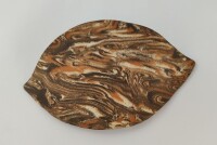 Large clay leaf as a hiding place in the aquarium
